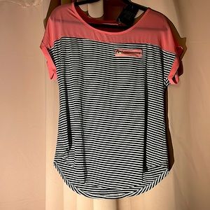 This is a Ashley Blue, black and white striped shirt with blush pink accents!